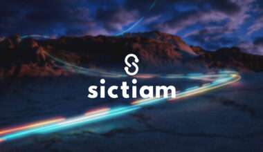 logo Sictiam avec en fond un paysage rocheux sombre sous un ciel crépusculaire
